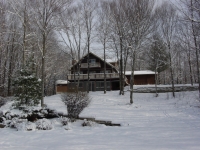 A view from the west side, from the golf course, during winter.