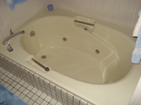 Jetted tub in bathroom on main floor.