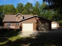 View of home showing the front of the attached garage.