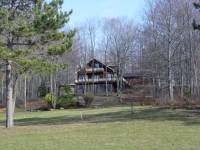 Front view of home from the 13th fairway.